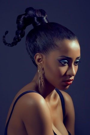 PLAITED HAIRSTYLE
