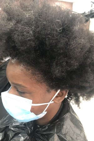 straighten afro hair at Afrotherapy hair salon in Edmonton, London